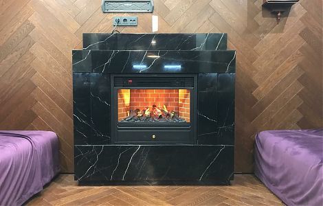 Облицовка камина черным мрамором Nero Marquina